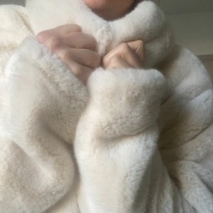 Manteau fausse fourrure femme