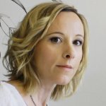 Laura L.